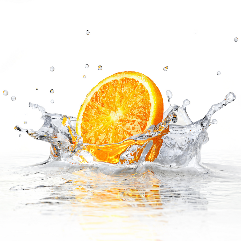 slice of orange splashing in water